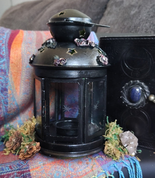 Close-up of a lantern with decorative elements on a colorful fabric background
